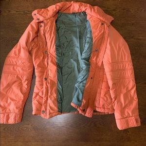 Orange coat by Lilu.